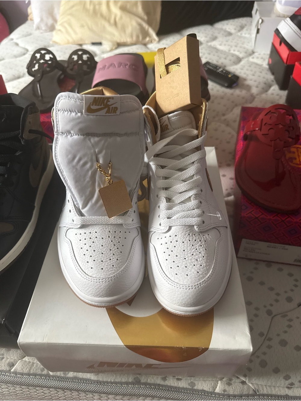 Nike Women's White Leather Sneakers with Gold Accents